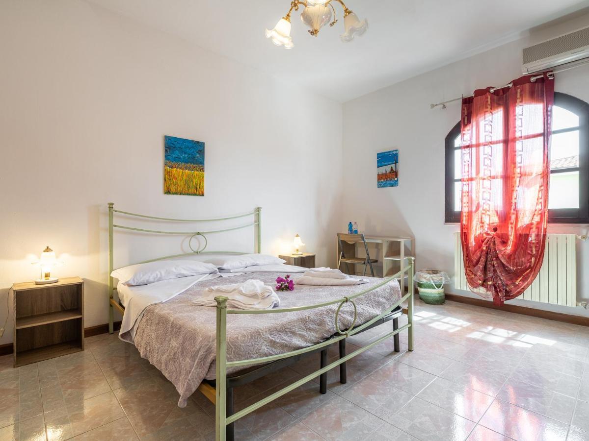 Camera Familiare con Bagno in Comune