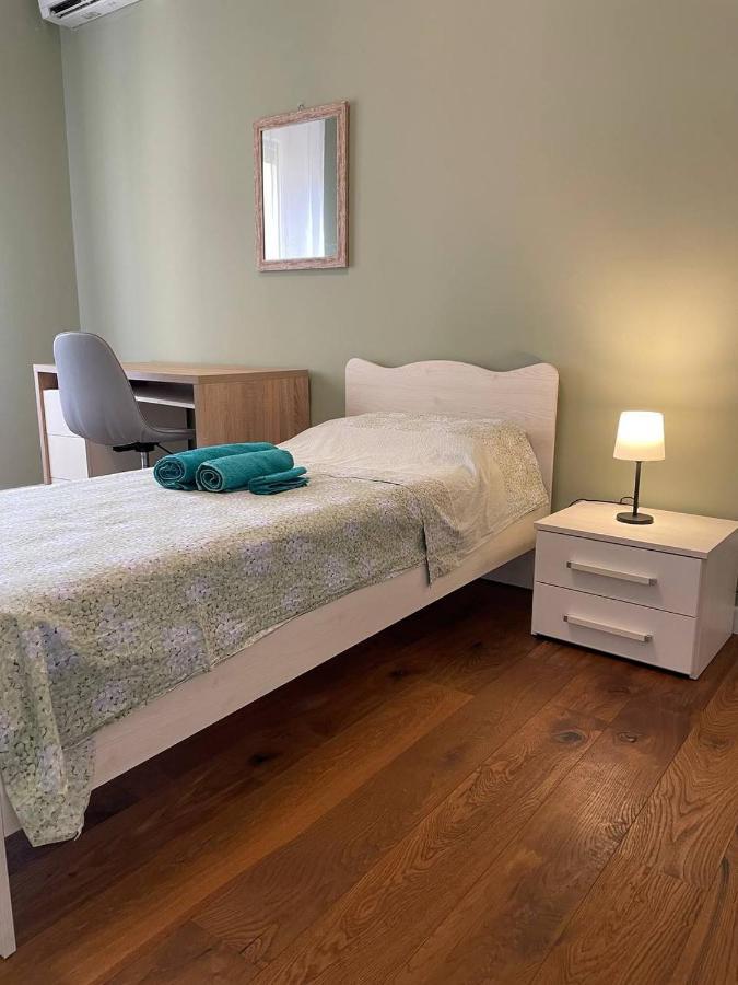 Camera Singola con Bagno in Comune