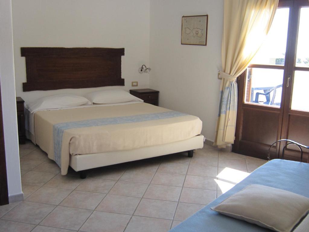 Chambre Triple Confort - Vue sur Piscine