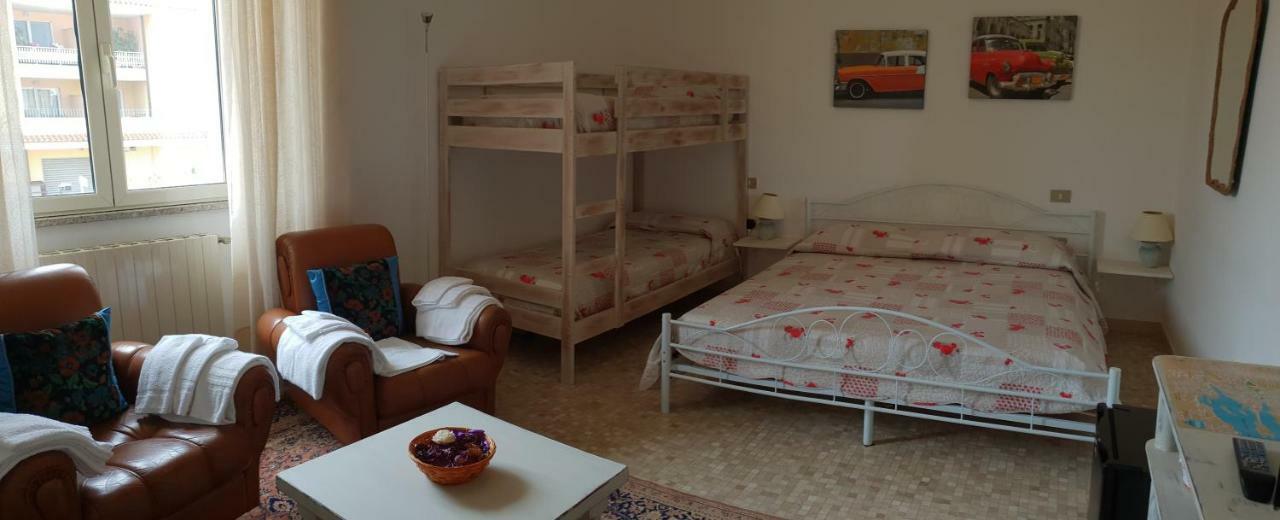 Chambre Quadruple avec Salle de Bains Commune